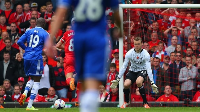 Chelsea's Demba Ba bears down on Simon Mignolet before scoring past the Liverpool 'keeper