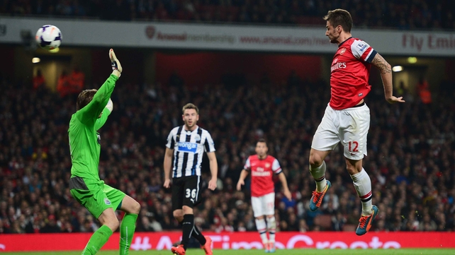 Olivier Giroud heads home Arsenal's third