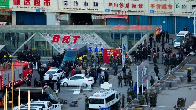 Police and emergency personnel gather outside the railway station Police and emergency personnel gather outside the railway station