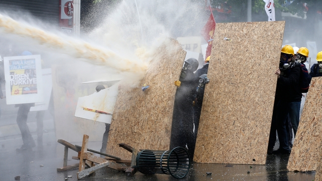 Turkish riot police use water cannon and tear gas to disperse protesters during a rally for May Day in Istanbul Turkish riot police use water cannon and tear gas to disperse protesters during a rally for May Day in Istanbul