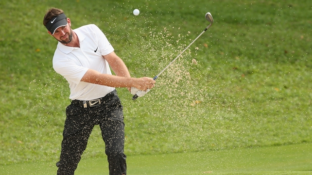 Scott Jamieson plays a bunker shot on the 17th hole