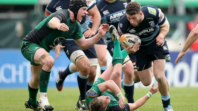 Connacht's Conor Gilsenan and Kieran Marmion with Alex Cuthbert of Cardiff