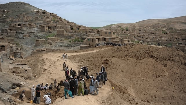 Afghan villagers affected by landslides look for survivors and victims in the Argo district of Badakhshan Afghan villagers affected by landslides look for survivors and victims in the Argo district of Badakhshan