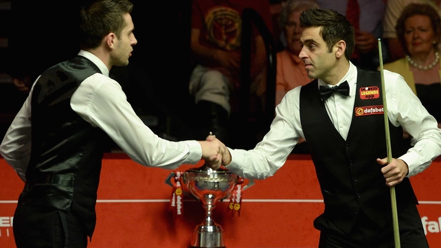 Ronnie O'Sullivan (right) lost the World Snooker Championship final to Mark Selby on Monday night