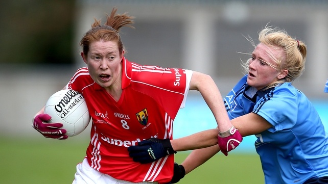 Dublin's Rachel Ruddy (R) tries to get to grips with Cork's Rena Buckley