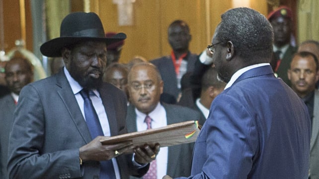 Salva Kiir (L), President of South Sudan, and Riek Machar (R), SPLM Opposition leader, hand over the Cessation of Hostilities treaty Salva Kiir (L), President of South Sudan, and Riek Machar (R), SPLM Opposition leader, hand over the Cessation of Hostilities treaty