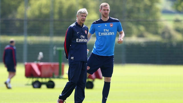 Per Mertesacker with Arsenal manager Arsene Wenger