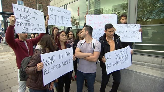 Students protesting outside one of the schools that closed in recent weeks Students protesting outside one of the schools that closed in recent weeks