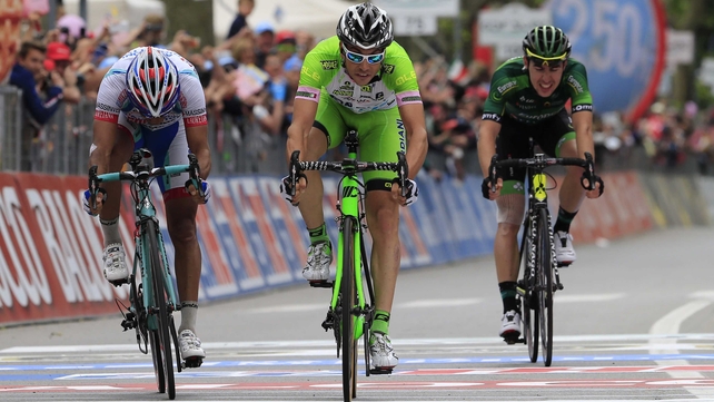 Marco Canola crosses the line to take stage 13 of the Giro