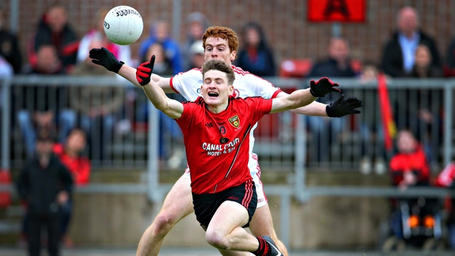 Tyrone's Peter Harte and Conor Maginn of Down