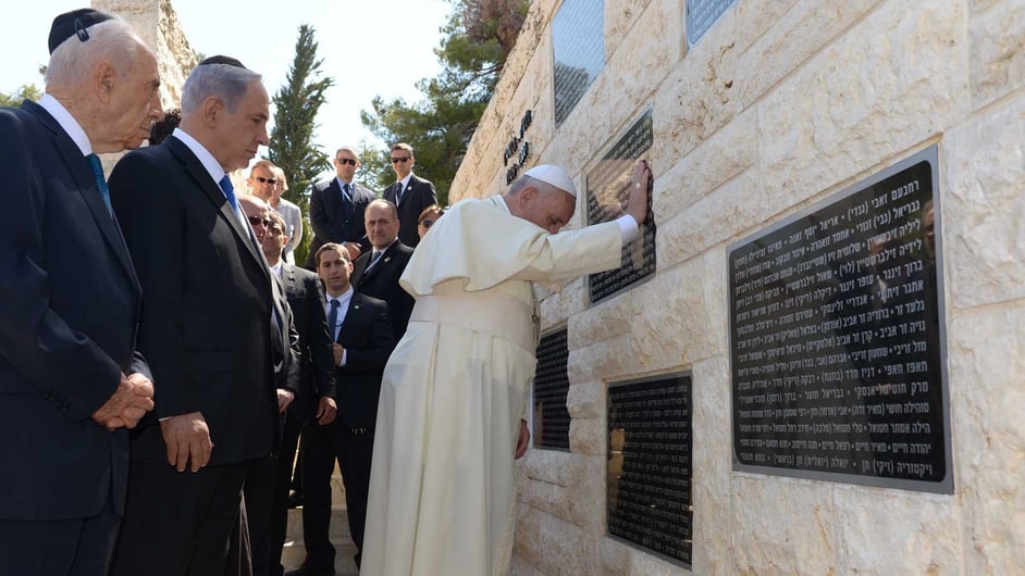 Israeli President Shimon Peres and Prime Minister Benjamin Netanyahu accompany Pope Francis as he visits the memorial monument commemorating victims of terrorist acts on Mount Herz