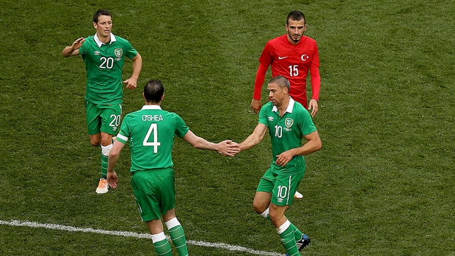 John O'Shea celebrates with Jon Walters after the latter's goal against Turkey