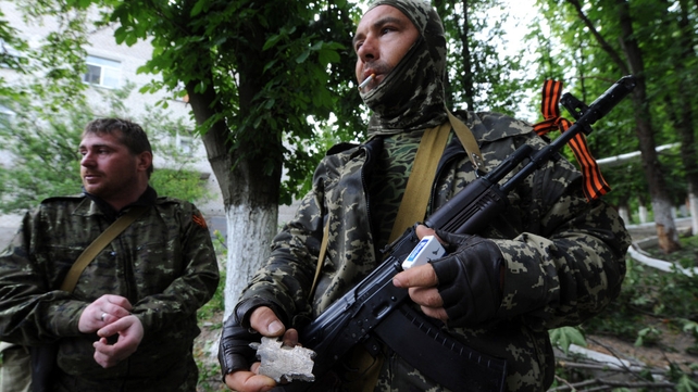 Pro-Russian militants stand guard in Semyonovka village, not far from Slaviansk Pro-Russian militants stand guard in Semyonovka village, not far from Slaviansk