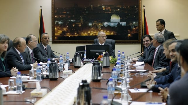 Palestinian Prime Minister, Rami Hamdallah (C) chairs the first cabinet meeting of the new Palestinian unity government in the West Bank city of Ramallah Palestinian Prime Minister, Rami Hamdallah (C) chairs the first cabinet meeting of the new Palestinian unity government in the West Bank city of Ramallah