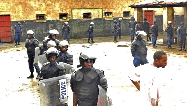 Congolese police officers standing guard at the Bukavu Central Prison in Kinshasa in January last year following a jailbreak Congolese police officers standing guard at the Bukavu Central Prison in Kinshasa in January last year following a jailbreak