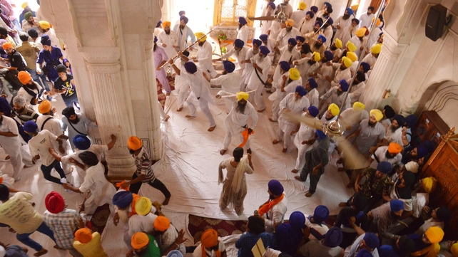 Sikh activists clash with members of the Shiromani Gurudwara Prabhandak Committee (SGPC) Sikh activists clash with members of the Shiromani Gurudwara Prabhandak Committee (SGPC)