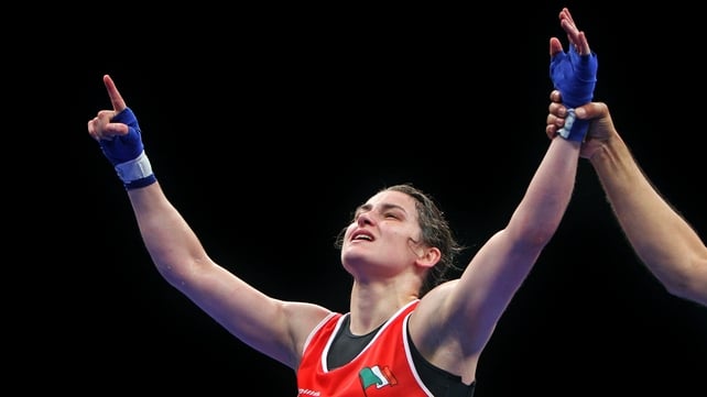 Katie Taylor celebrates on hearing she has won the title