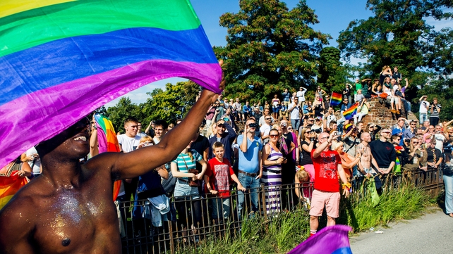 Participants of the Copenhagen Pride Parade walk through a street in Copenhagen, Denmark last August Participants of the Copenhagen Pride Parade walk through a street in Copenhagen, Denmark last August