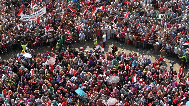 Egyptians wearing fluorescent outfits protecting women from harassment at Tahrir square last year Egyptians wearing fluorescent outfits protecting women from harassment at Tahrir square last year