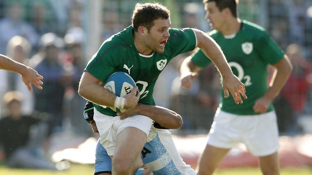 Ireland's Darren Cave is tackled by an Argentina defender