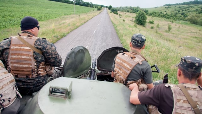 Ukrainian troops patrol an area near the border of Ukraine with Russia outside Kharkiv Ukrainian troops patrol an area near the border of Ukraine with Russia outside Kharkiv