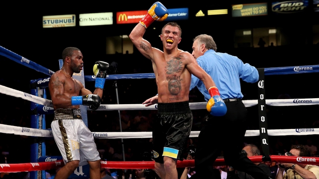 Vasyl Lomachenko celebrates after the final bell against Gary Russell Jr.