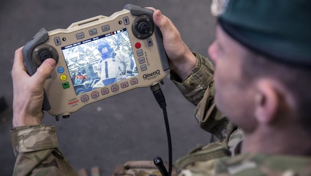 A soldier operates the control unit of a bomb disposal robot as part of a showcases of future specialist capabilities A soldier operates the control unit of a bomb disposal robot as part of a showcases of future specialist capabilities