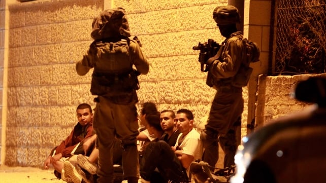 Israeli security forces detain Palestinian men in the West Bank village of Beit Sahur Israeli security forces detain Palestinian men in the West Bank village of Beit Sahur