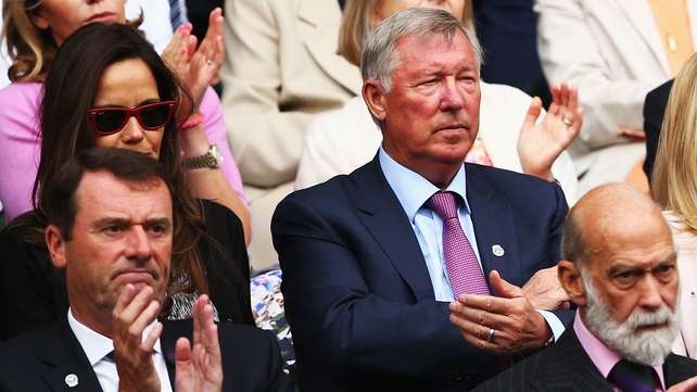 Alex Ferguson watches play from the Royal Box at Wimbledon yesterday