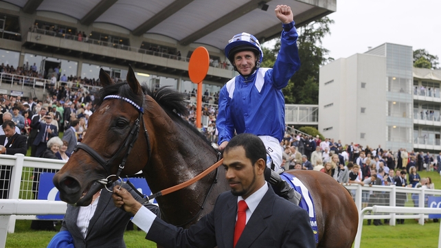 Paul Hanagan riding Mukhadram celebrates winning The Coral Eclipse at Sandown