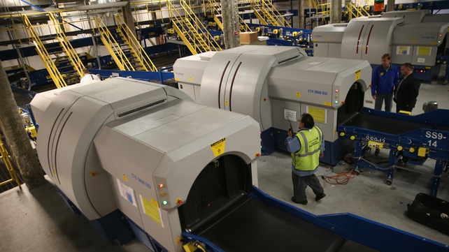 Luggage moves through a new explosives detection system at Newark Airport in New York Luggage moves through a new explosives detection system at Newark Airport in New York