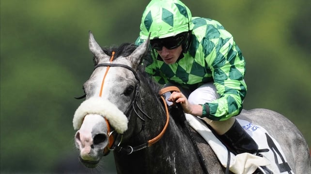 Ryan Moore riding The Grey Gatsby to victory at The Prix Du Jockey Club