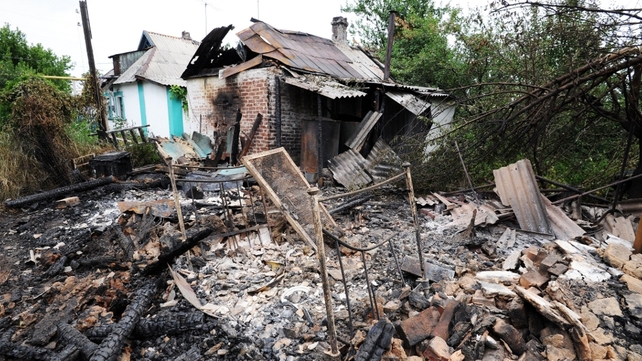 The shell landed in the garden of a house in a small town on the Russian called Donetsk The shell landed in the garden of a house in a small town on the Russian called Donetsk