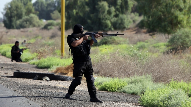 Shia volunteers, loyal to Muslim Shiite cleric Moqtada al-Sadr, take positions during a military advance in areas under the control of Islamic State Shia volunteers, loyal to Muslim Shiite cleric Moqtada al-Sadr, take positions during a military advance in areas under the control of Islamic State