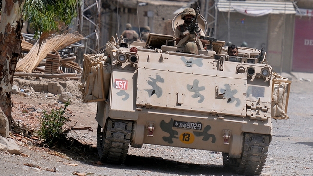 Pakistani soldiers patrol during a military operation against Taliban militants Pakistani soldiers patrol during a military operation against Taliban militants