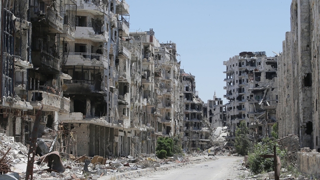 Destroyed buildings are seen in the Homs neighbourhood of Khaldiyeh, formerly held by rebel fighters and captured by Syrian government forces Destroyed buildings are seen in the Homs neighbourhood of Khaldiyeh, formerly held by rebel fighters and captured by Syrian government forces
