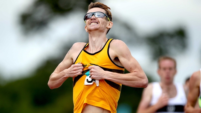 Ciarán O'Lionaird celebrates after crossing the line