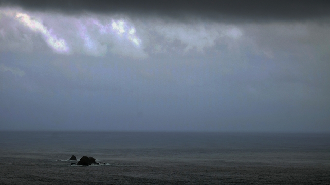 Dark clouds seen over an island in Taiwan, which has been hit by Typhoon Matmo Dark clouds seen over an island in Taiwan, which has been hit by Typhoon Matmo