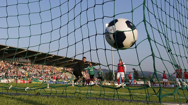 Miroslav Radovic slots the ball past Brendan Clarke in the St Patrick's Athletic goal to open the scoring at Tallaght Stadium