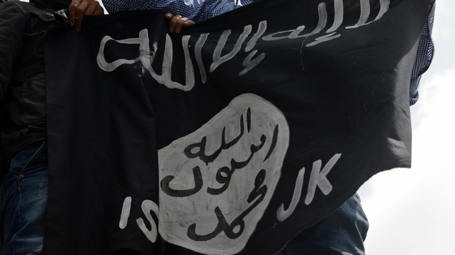 The flag of the Islamic State (IS), which is reported to have ordered female genital mutilation The flag of the Islamic State (IS), which is reported to have ordered female genital mutilation
