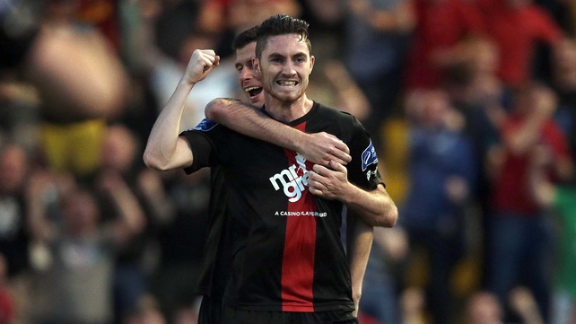 Bohemians' Dinny Corcoran congratulates goalscorer Eoin Wearen