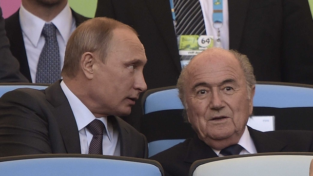 Russian President Vladimir Putin (L) and FIFA President Joseph Blatter at this summer's World Cup in Brazil