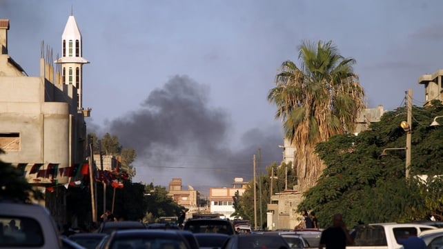 The clashes are between rival militia groups battling over the city's main airport The clashes are between rival militia groups battling over the city's main airport