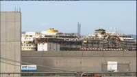 Six One News: Wreck of Costa Concordia arrives in Genoa Six One News: Wreck of Costa Concordia arrives in Genoa
