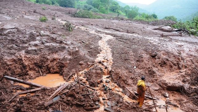 The confirmed death toll after a landslide in India stands at 21 The confirmed death toll after a landslide in India stands at 21