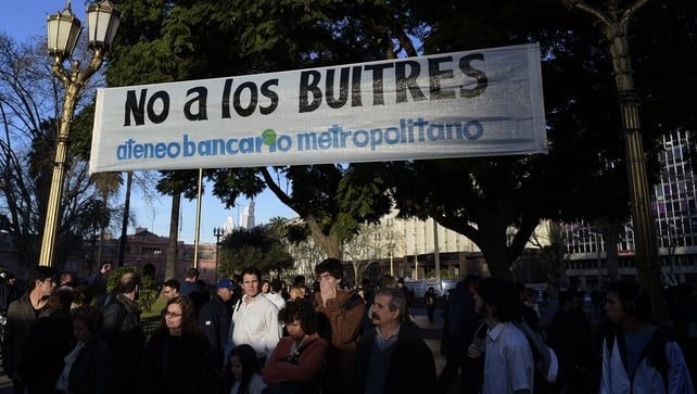 A banner reading 'No to the vultures' is seen at Plaza de Mayo square in Buenos Aires during recent demonstrations A banner reading 'No to the vultures' is seen at Plaza de Mayo square in Buenos Aires during recent demonstrations