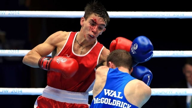 Michael Conlan (Red) in action against Wales' Sean Mcgoldrick (Blue)