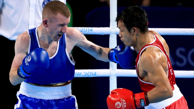 Paddy Barnes connects with a left during his final against Devendro Laishram