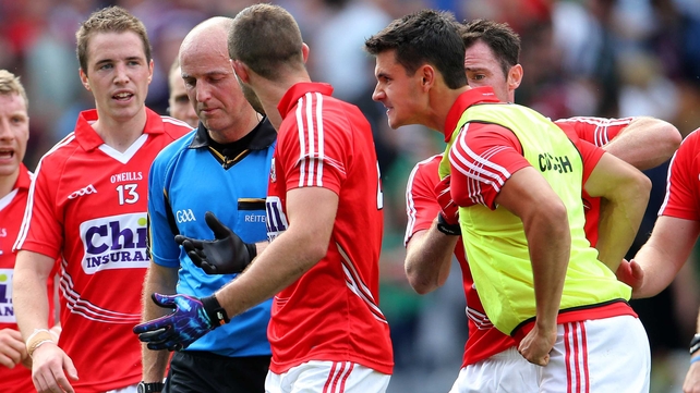Cork players remonstrate with referee Cormac Reilly at full-time, including Tomas Clancy (bib), who was black carded earlier in the game