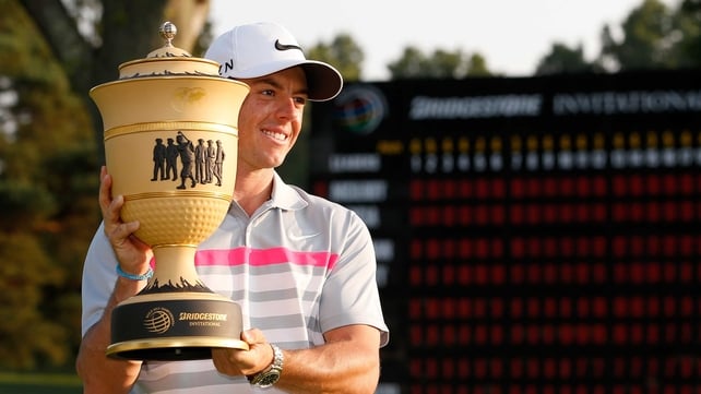 Rory McIlroy holds the Gary Player Cup after winning the World Golf Championships-Bridgestone Invitational